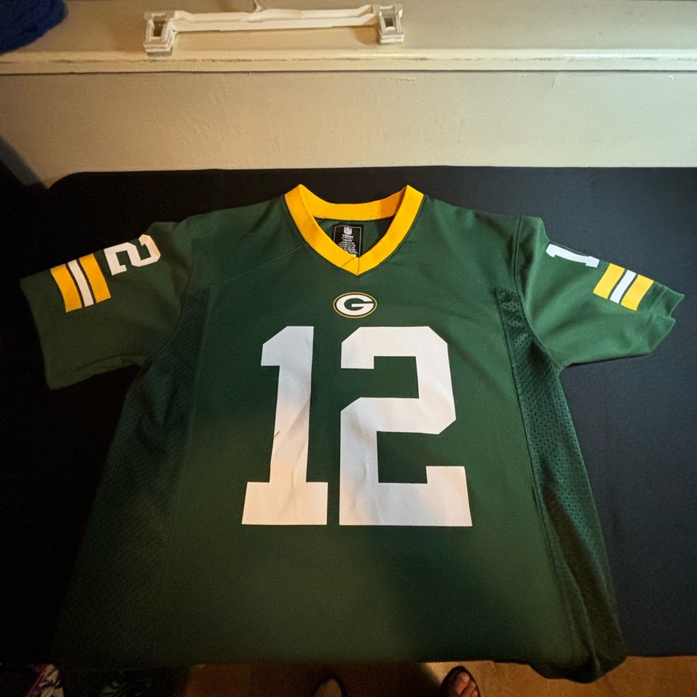 Rodger’s youth Large packers jersey